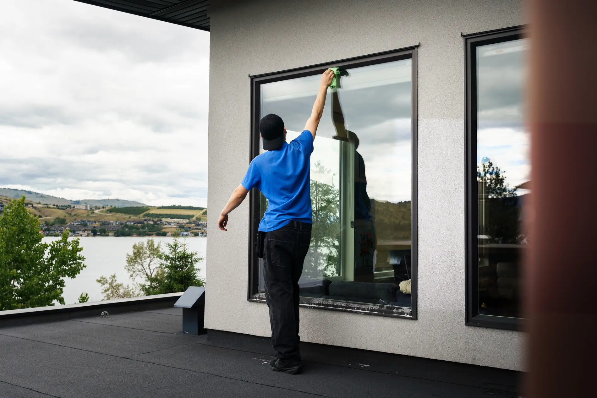 Vernon Clearview cleaning exterior windows above Okanagan Lake